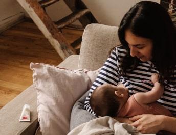 Mom feeding her baby